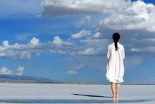 woman standing on beach